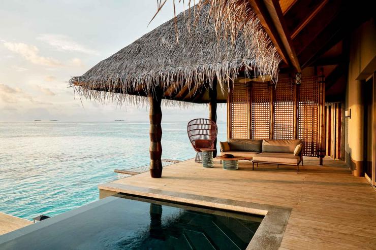 joali maldives sunset luxury water villa with pool deck 1